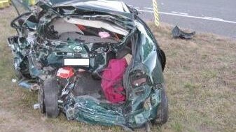 One car was badly crushed in the crash on the Monaro Highway.