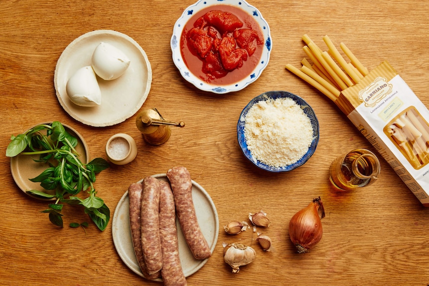 Basil, pork sausages, buffalo mozzarella, tinned tomato and pasta are some of the ingredients needed for pasta al forno. 
