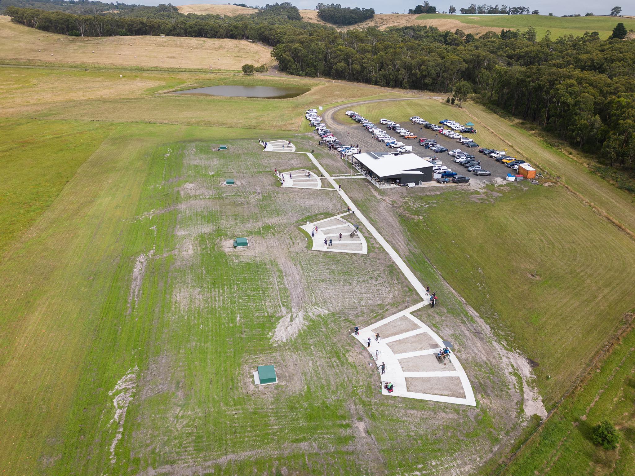 An aerial photo of a gun club including shooting range and clubhouse.