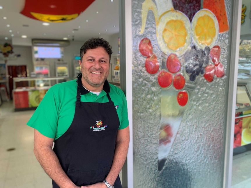 Eric Pace stands outside of his family's gelataria.