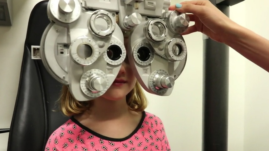 A girl getting her eyes tested