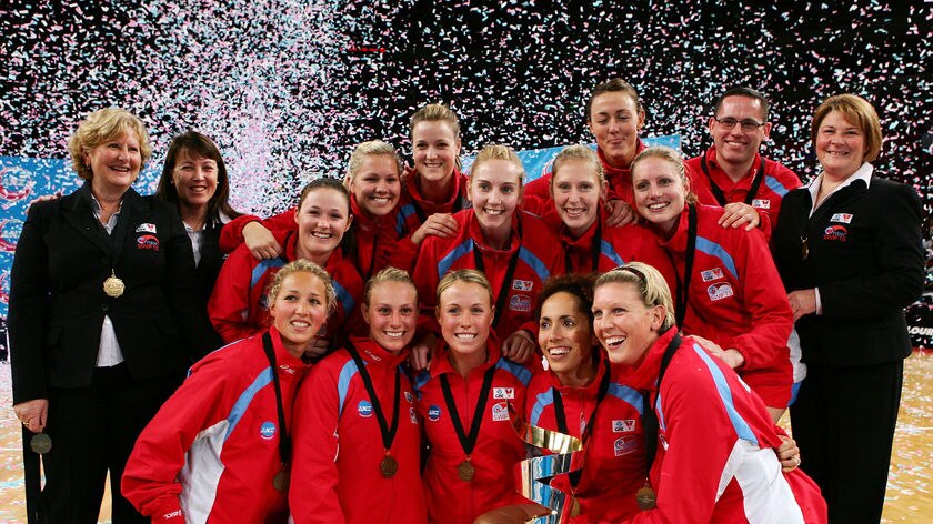 The NSW Swifts celebrate with the trophy