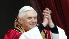 Joseph Ratzinger, the new Pope, appears at the window of Saint Peter&#39;s Basilica.