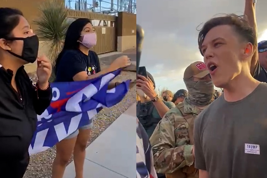 A young man yelling at masked young women at a rally 