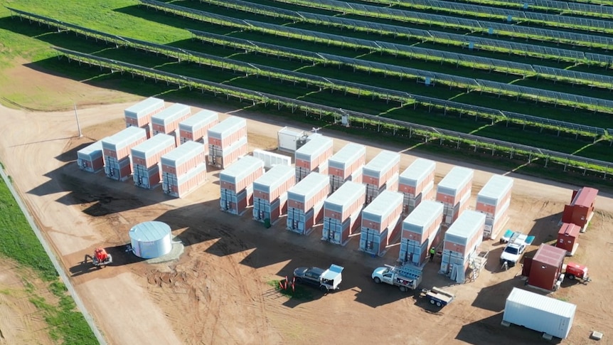 a birds-eye-view of large rectangular boxes connected to a solar panel grid.