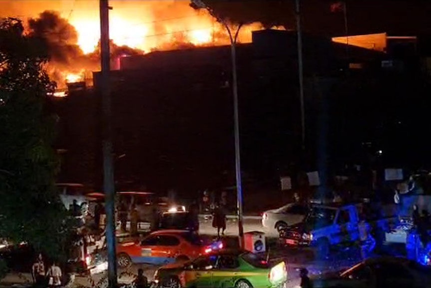 Footage shows Port Moresby warehouse in flames after being ransacked