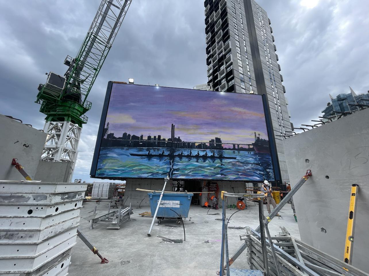 A large artwork dispalyed within a construction site