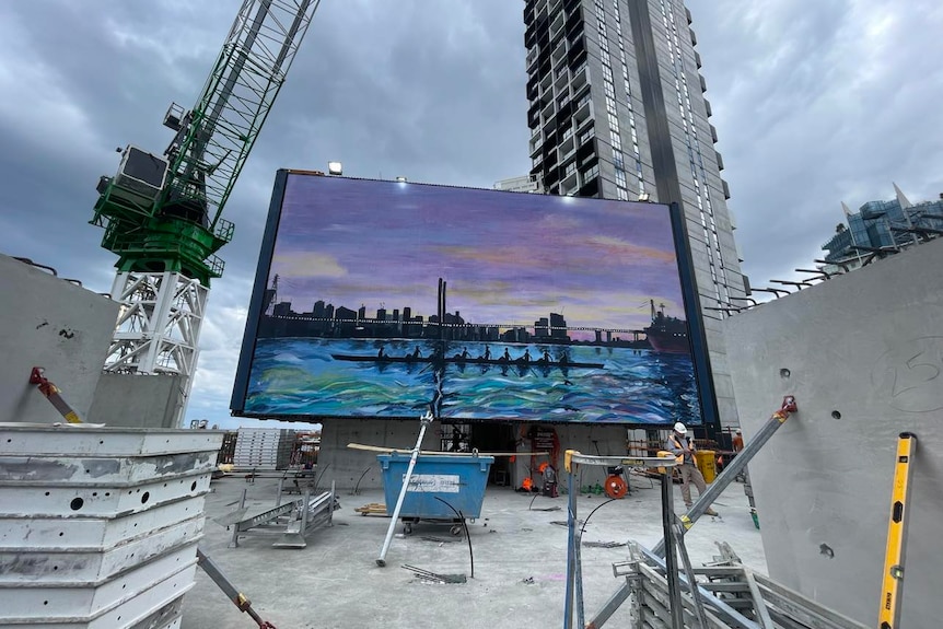 A large artwork dispalyed within a construction site