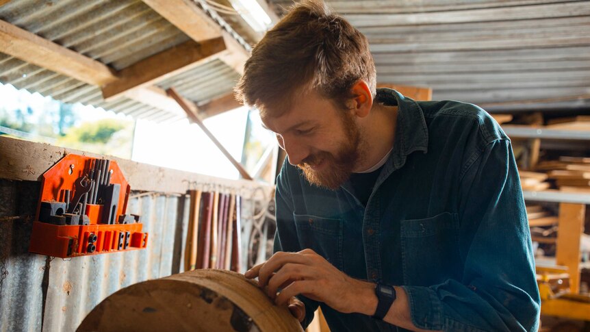 Beau Jorgensen of Haldane Drums demonstrating the lathing process.