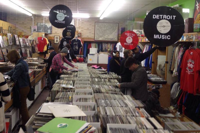 People rifling through records at Detroit records store Detroit Threads