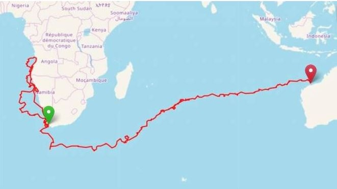 World map showing red line marking Yoshi's journey from South Africa to Australia