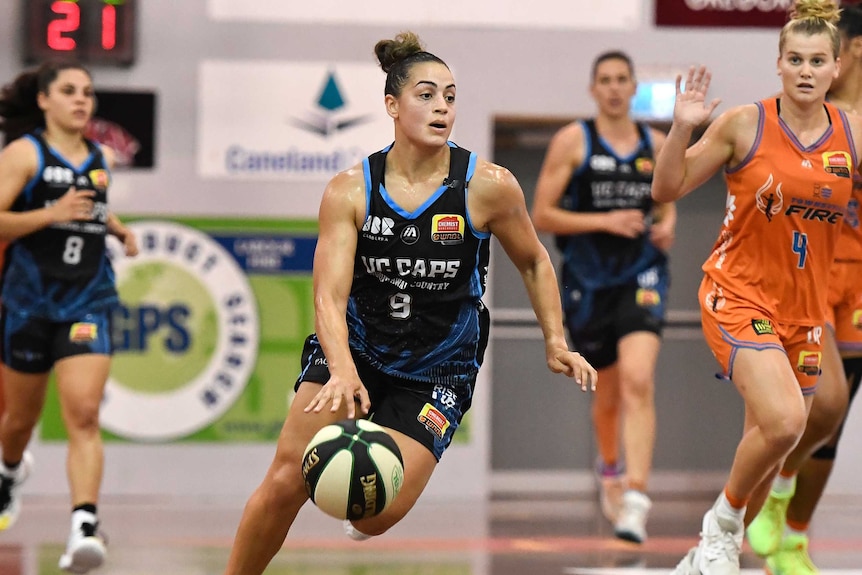 A Canberra Capitals guard playing in the 2020 WNBL.