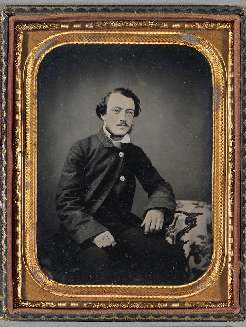 An old black-and-white photograph of a man in 1859