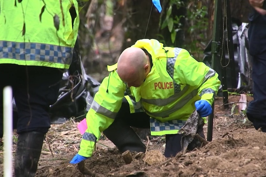 a man digging in the ground