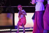 A young boy dances at a NAIDOC festival concert in Yirrkala, NT.