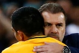 Ange Postecoglou embraces Tim Cahill