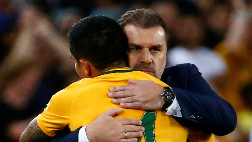 Ange Postecoglou embraces Tim Cahill