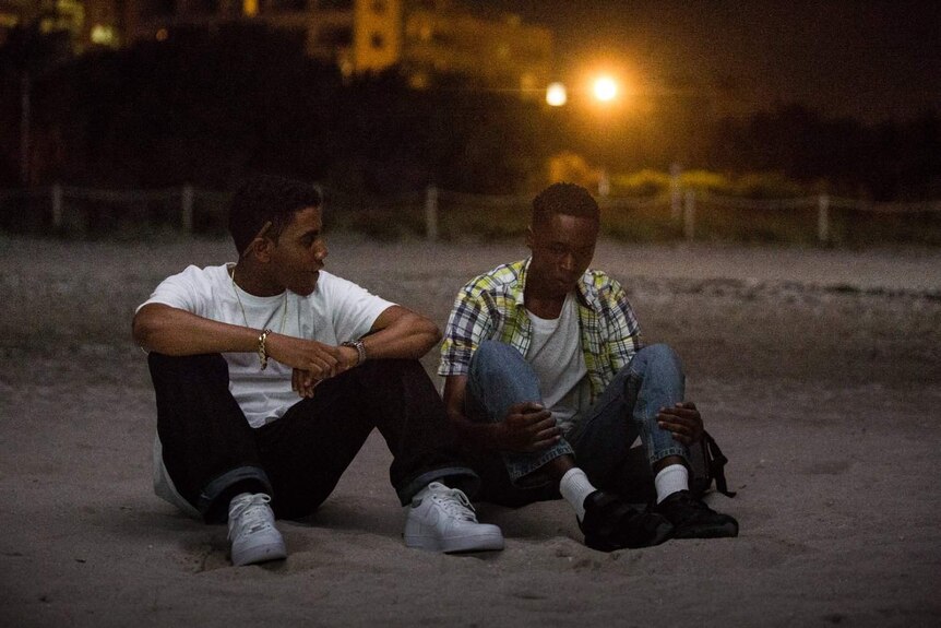 Ashton Sanders and Jharrel Jerome on the beach in a scene from Moonlight.
