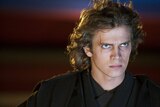 Hayden Christensen with a cut over his eye glaring moodily.