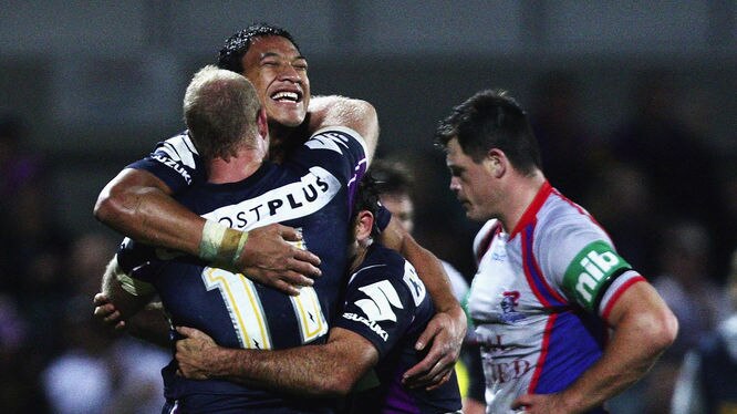 Israel Folau is congratulated on his double