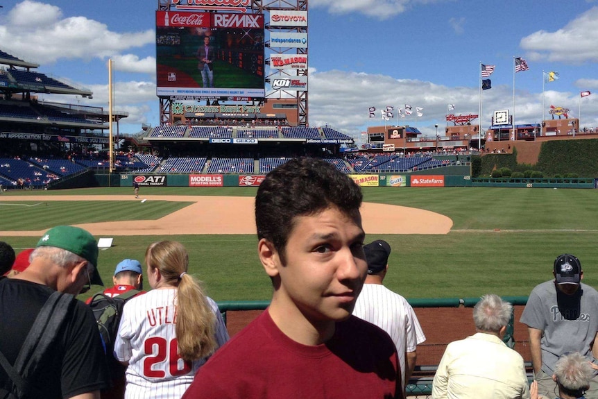 Mahmoud Hallek at an American baseball game