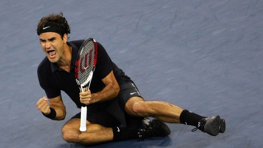 World number one Roger Federer drops to the ground after winning the US Open final