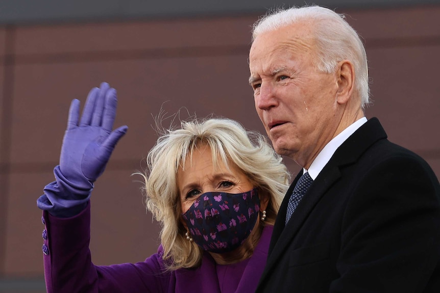 Dr Jill Biden wearing mask and President Joe Biden with tear rolling down his cheek.