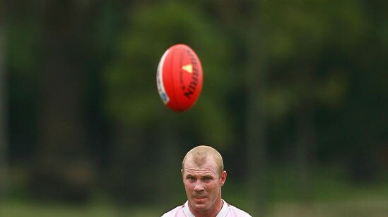Barry Hall in pink guernsey at Swans training