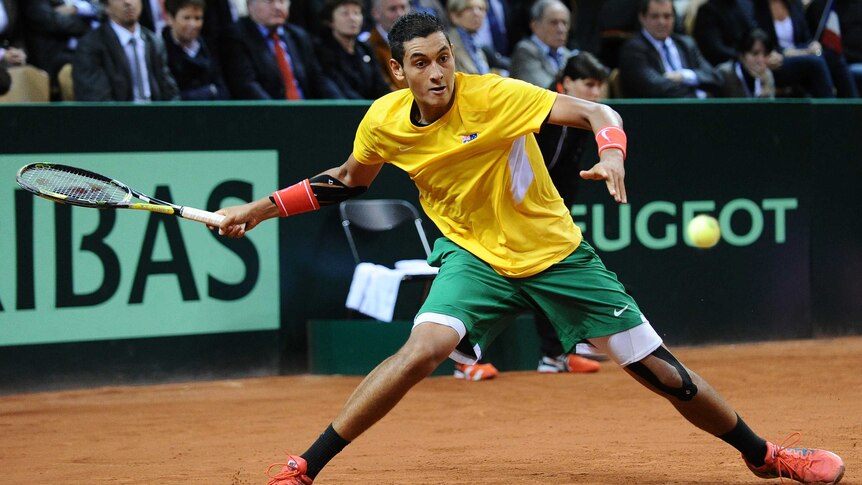 Tough outing ... Nick Kyrgios stretches for a forehand against Gael Monfils