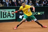 Tough outing ... Nick Kyrgios stretches for a forehand against Gael Monfils