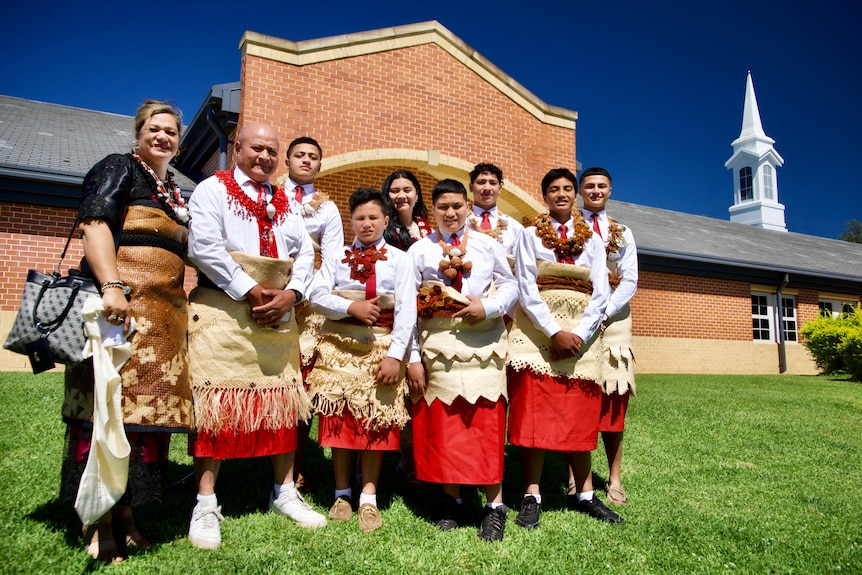 The Ta'ai family in traditional dress at church on Sunday. 