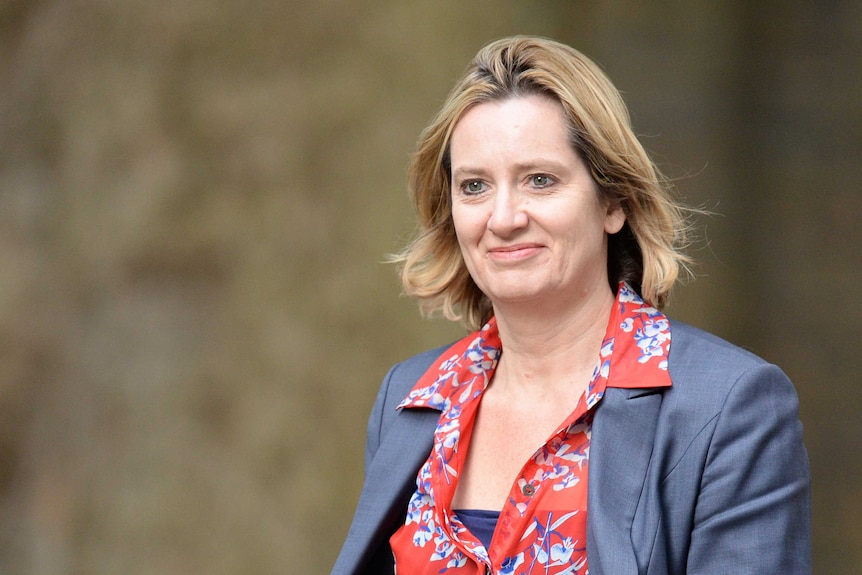 Amber Rudd walks into 10 Downing Street in central London.