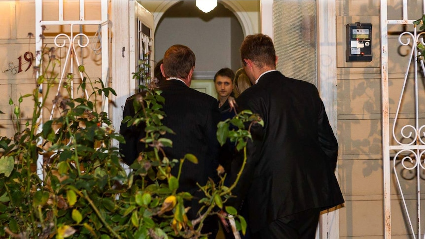 AFP officers at a Labor staffer's home