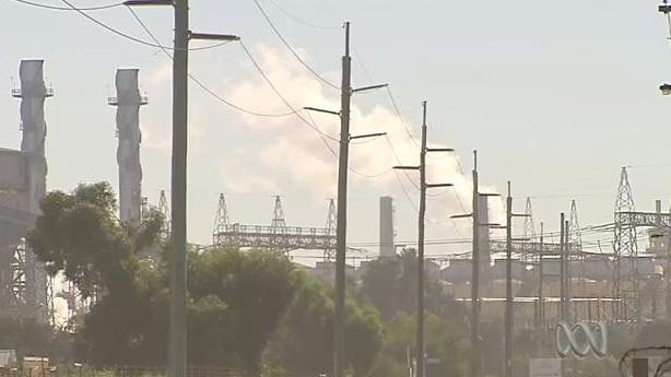 Steam pollution billows up from power station stacks
