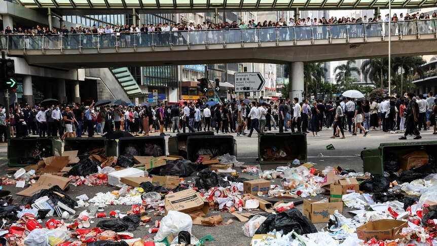 Garbage is  seen laid across a road by anti-government demonstrators as a barricade.