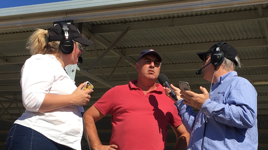 Menindee local Graham McCrabb speaks to ABC presenters Cassie Hough and Michael Condon