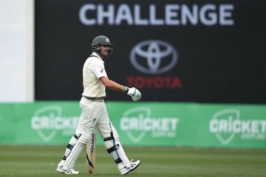 Australia's Joe Burns walks off after being dismissed for a duck on day three in Hobart