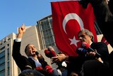 Ekrem Dumanli, editor-in-chief of Turkey's top-selling newspaper speaks to demonstrators