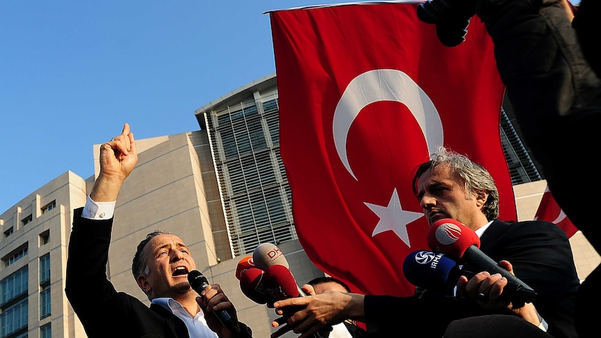 Ekrem Dumanli, editor-in-chief of Turkey's top-selling newspaper speaks to demonstrators