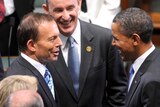 Tony Abbott greets Barack Obama in the House of Representatives chamber.