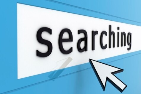 Mouse pointer hovering over the word 'Searching' on a blue background. (Thinkstock: iStockphoto)