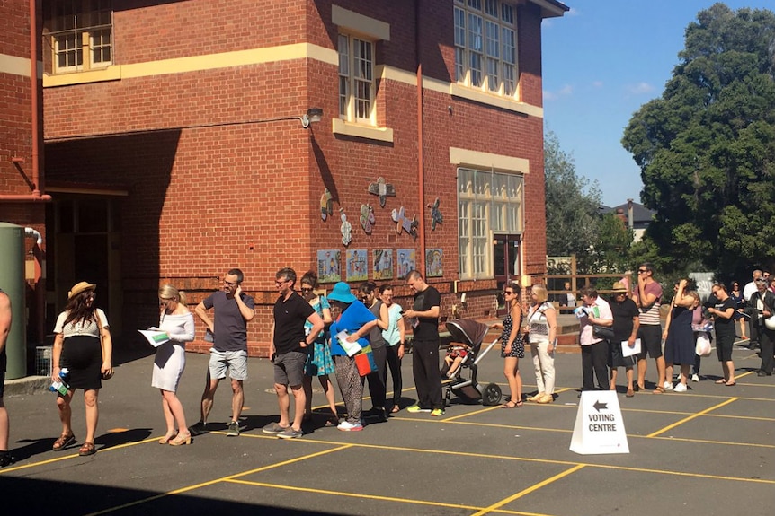 A long queue at Thornbury Primary School as residents vote in the Northcote by-election.