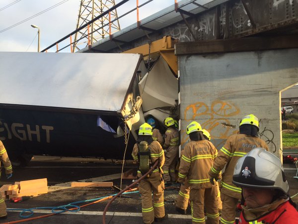 Driver Freed From Cab After Truck Crashes Into Rail Bridge In West ...