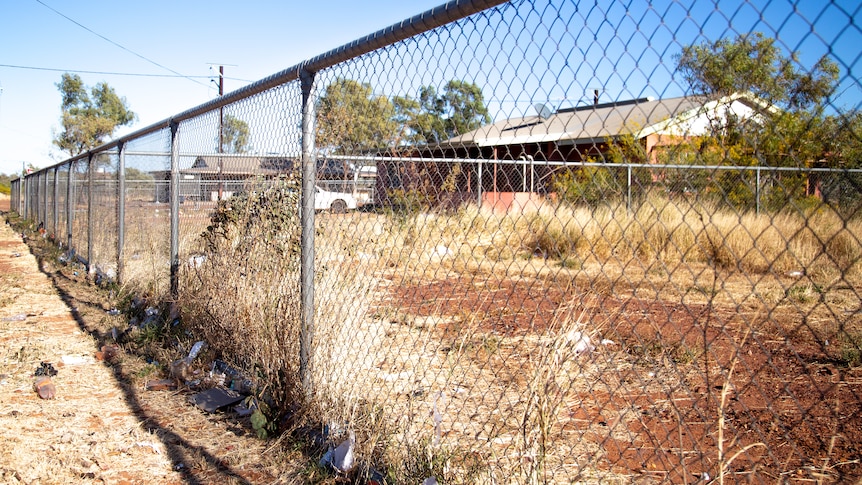 A house and a fence in remote location in the Northern Territory