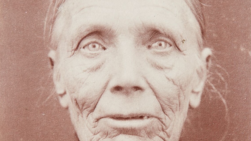 Black and white portrait of an elderly woman from the 1800s