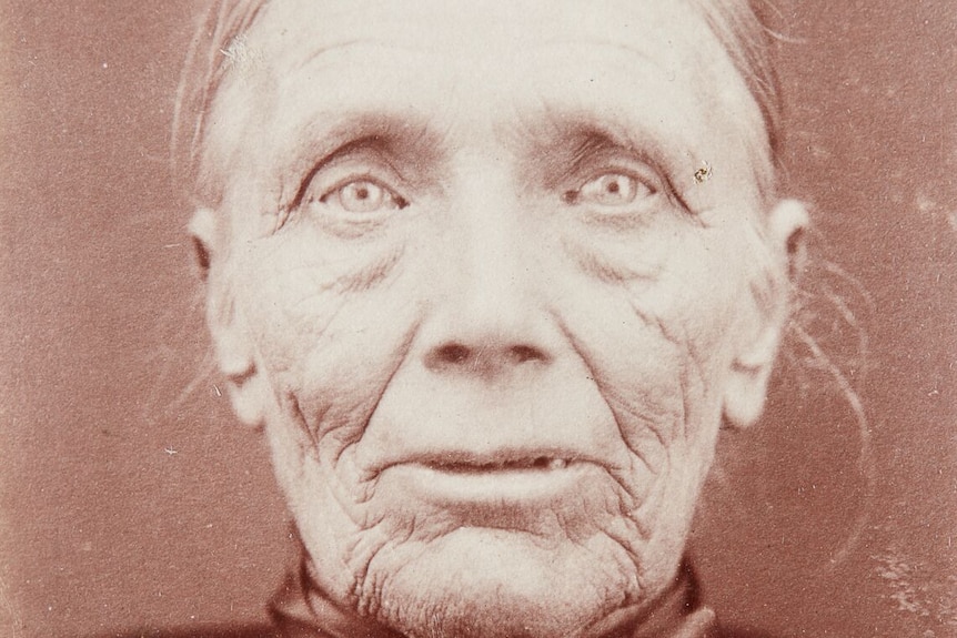 Black and white portrait of an elderly woman from the 1800s