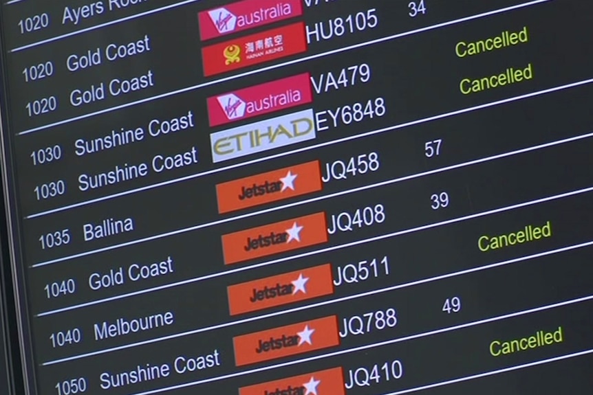 A display at the airport showing canceled flights