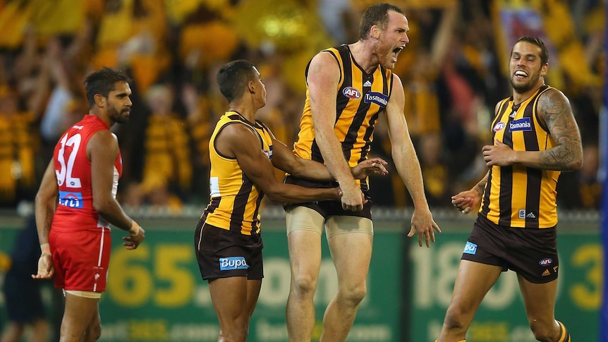 The Hawks congratulate Jarryd Roughead for his goal against Sydney.