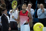 Australia's Nick Kyrgios gestures after beating Czech Republic's Tomas Berdych at Marseille Open.