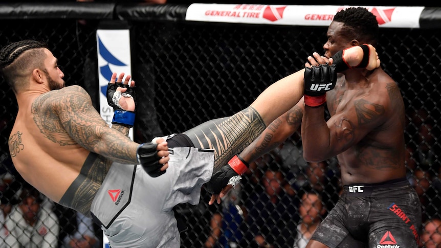 Tyson Pedro fights in a UFC bout